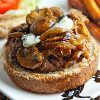 Burgers Topped with Caramelized Onions and Blue Cheese