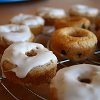 Orange Baked Donuts with Vanilla Creme Frosting